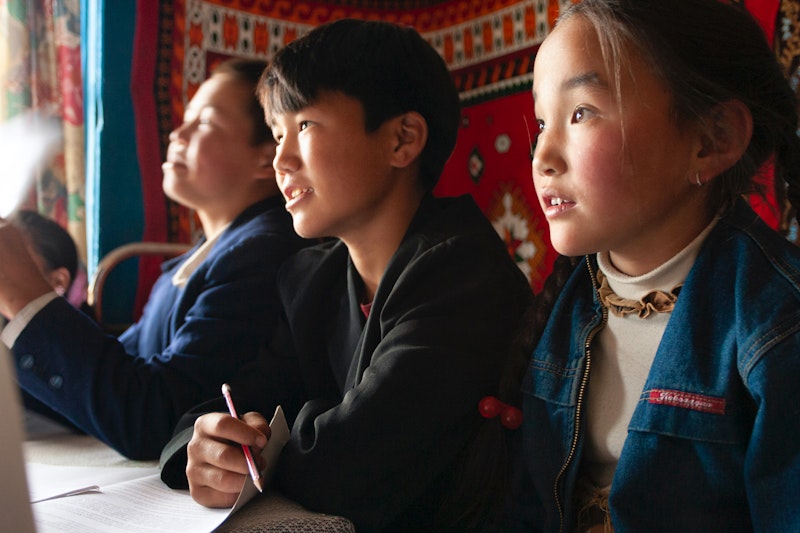 Children's Class Listening to Teacher