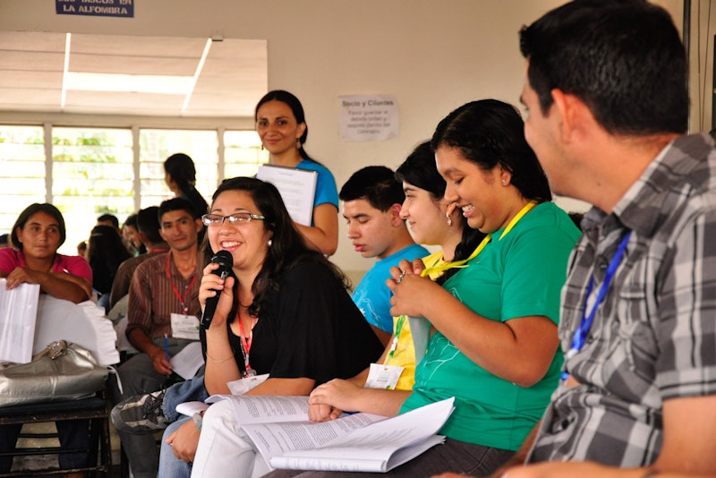 Group of youth reflecting in joy.