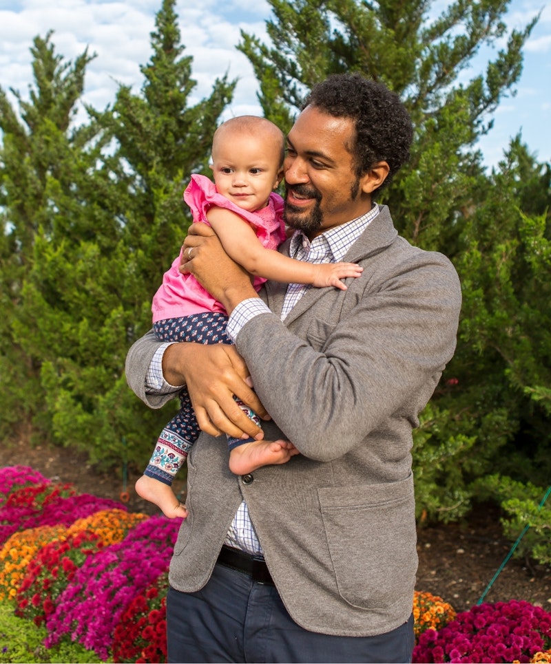 man holding a baby